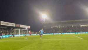 Read more about the article Non-league star slide tackled in the head by fan moments after sending team to Wembley