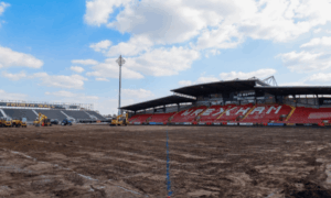 Read more about the article Wrexham make £1m stadium upgrade as Ryan Reynolds and Rob McElhenney begin Championship preparations