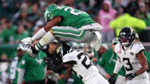 Read more about the article ‘His season is over’ – Saquon Barkley enjoys historic Eagles first but fans fear curse for Super Bowl winner